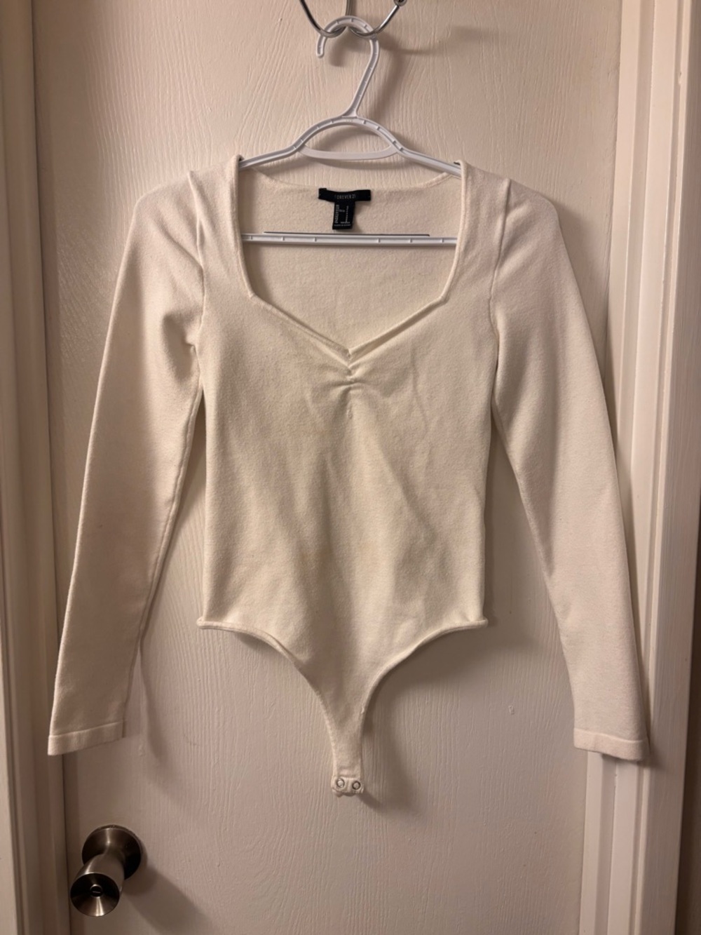 Forever 21 Cream Long Sleeve V‑Neck Bodysuit